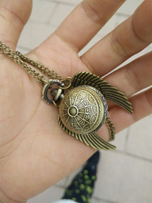 Antique gold pocket watch locket