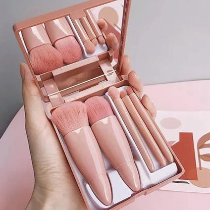 Cosmetic mirror with brushes